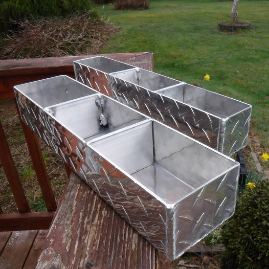 two diamond plate stainless steel caddy box with three sections