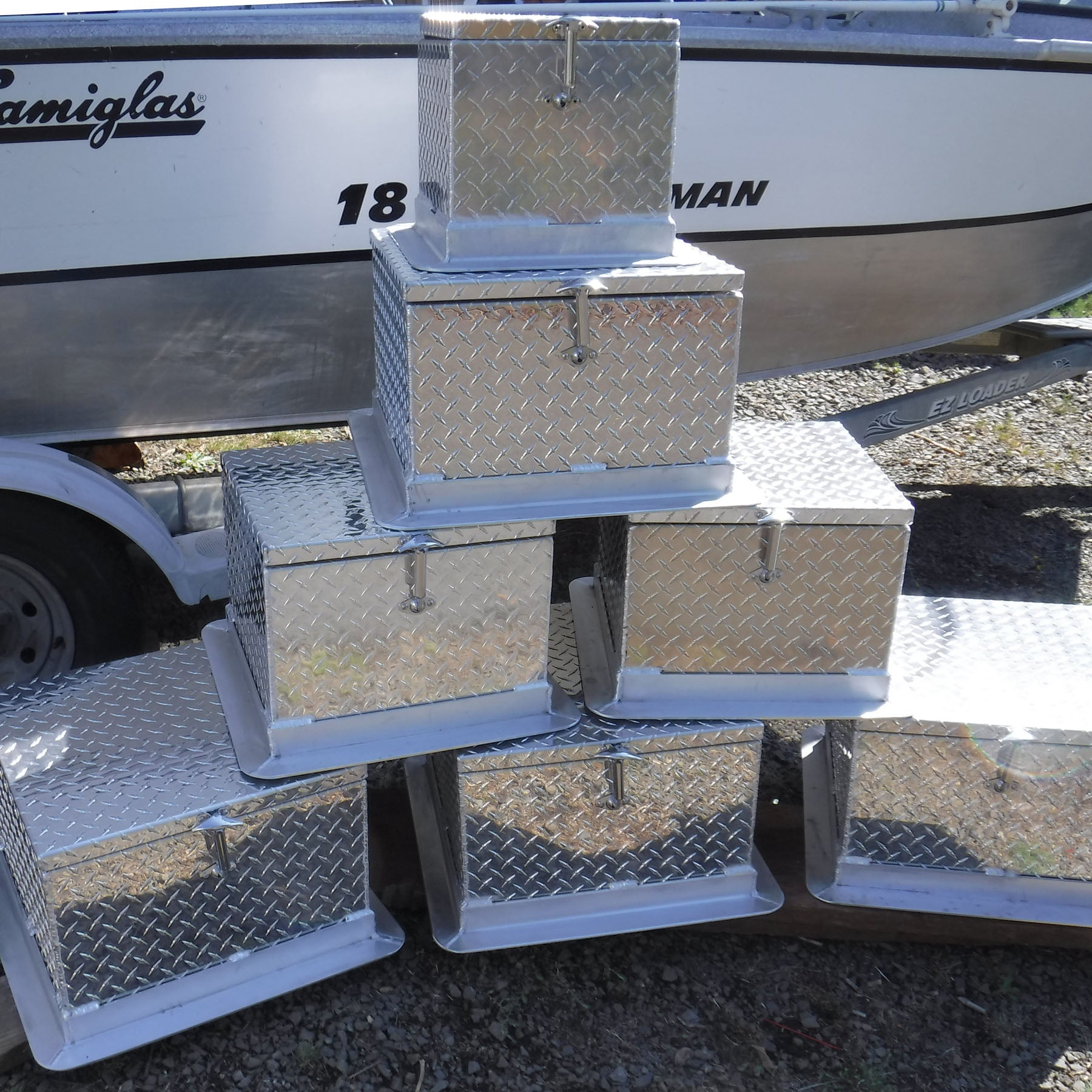 stack of diamond plate stainless steel boat seat boxes